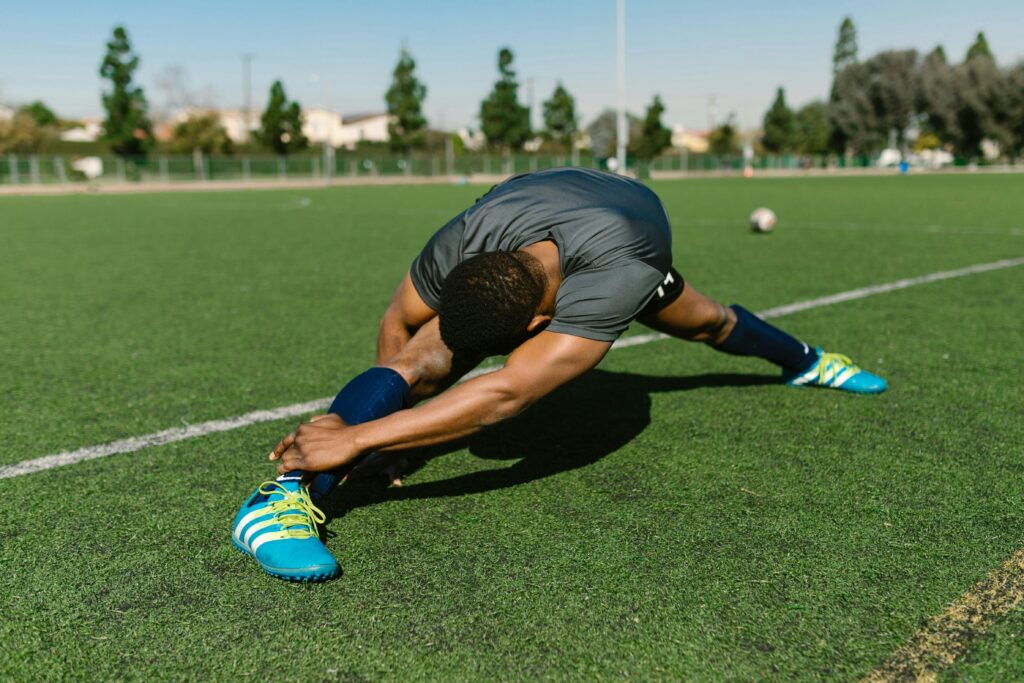 Soccer recovery routine with post-training stretching for soccer injury prevention.